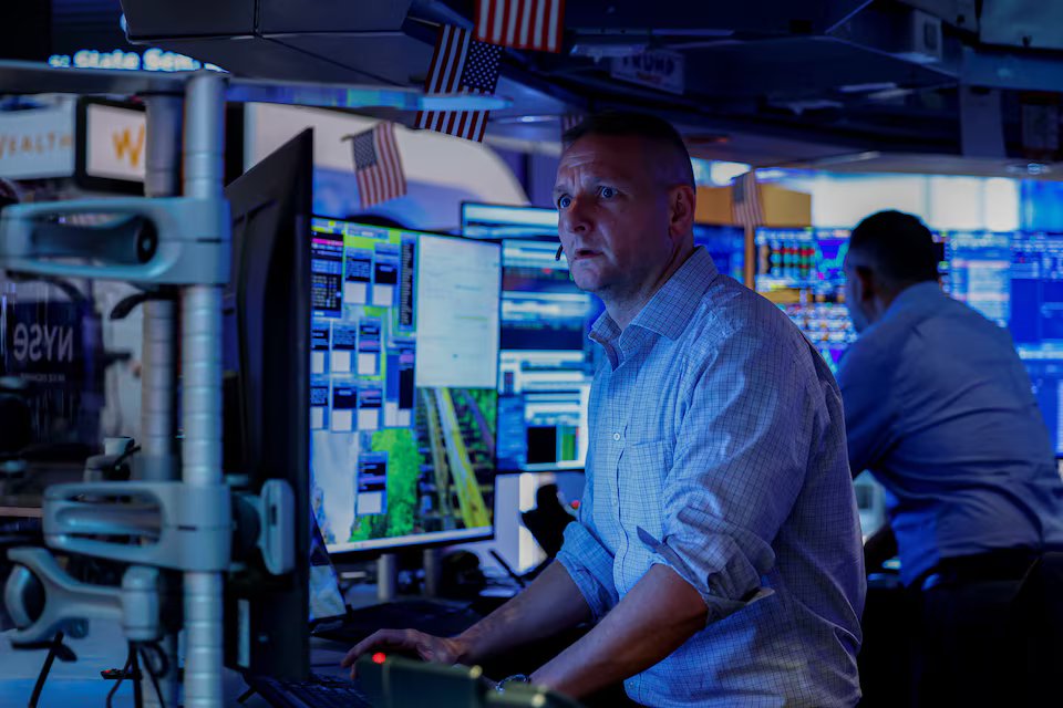 Shares steady, dollar slips as markets pare Fed rate risks.