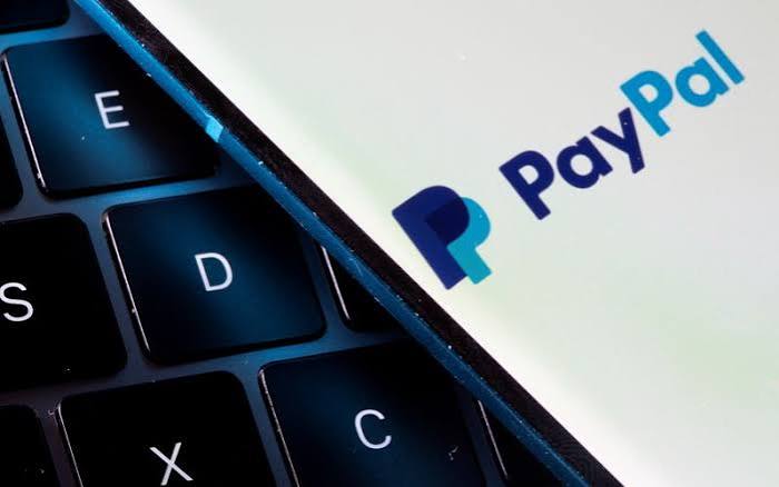 PayPal raises profit outlook as Q2 results top forecasts.
