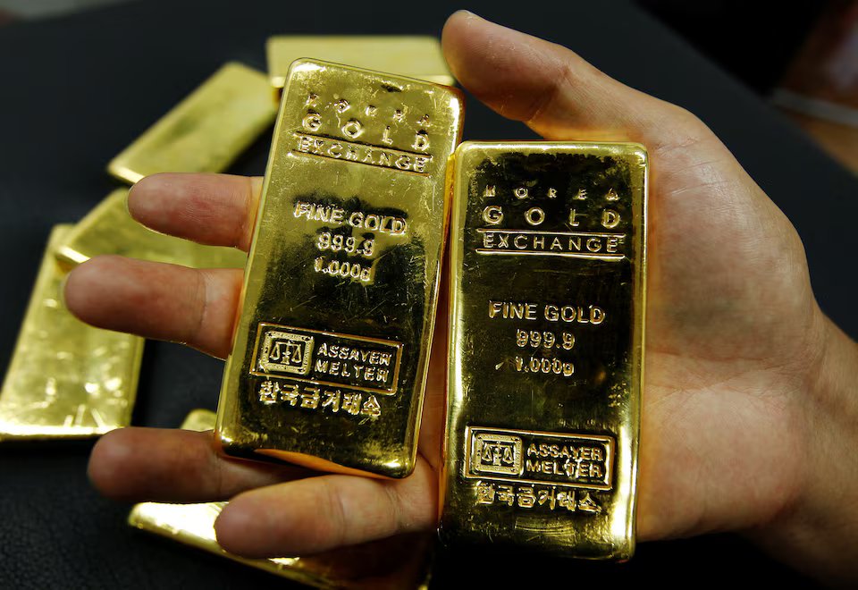 Gold scales one-month peak as US-Iran peace hopes ease inflation worries.