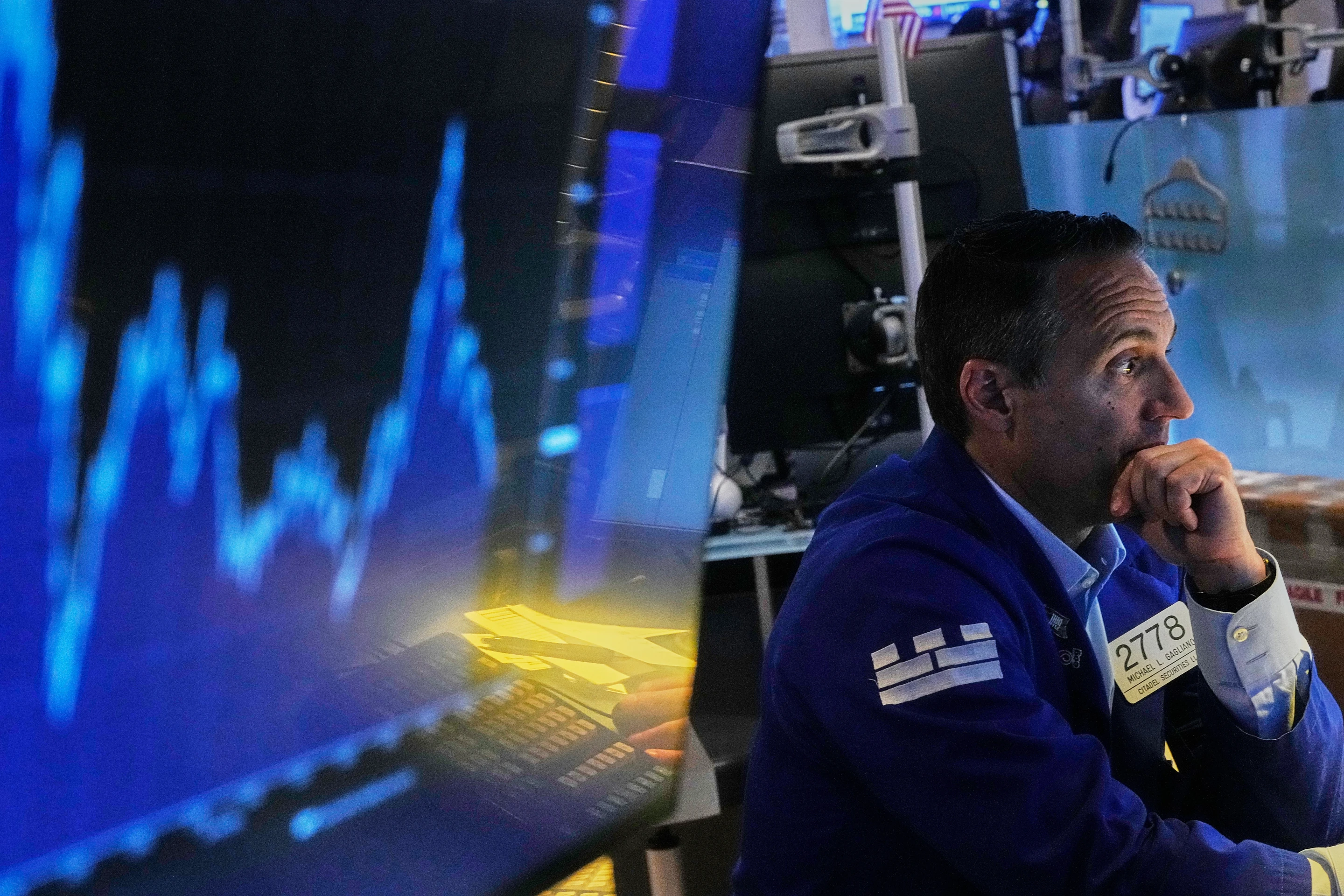 World shares skid as traders sell to lock in profits after recent rallies driven by AI.