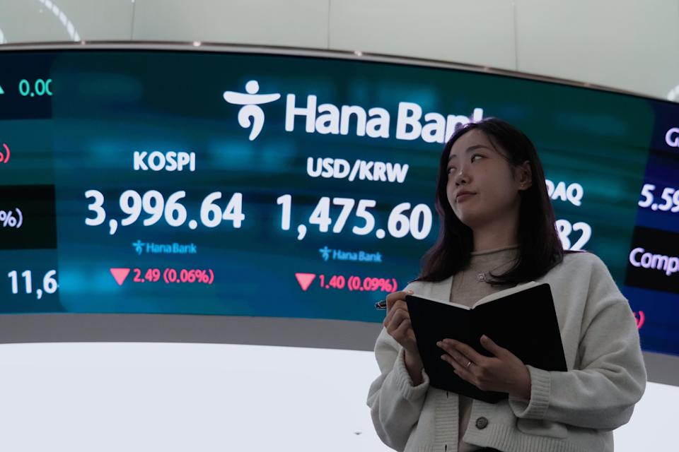Asian shares advance after Japan raises its key interest rate to its highest level in 30 years.
