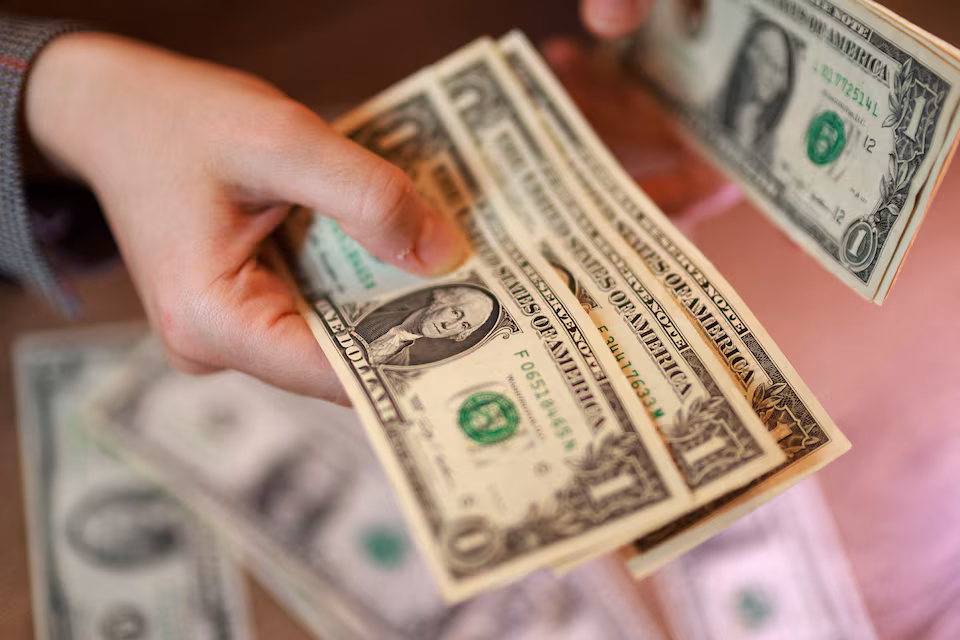 Dollar at one-week high on Middle East uncertainty, hot US inflation.